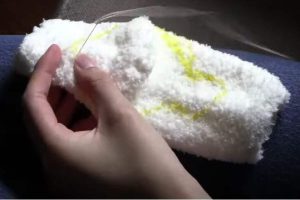 Stitching the white sock