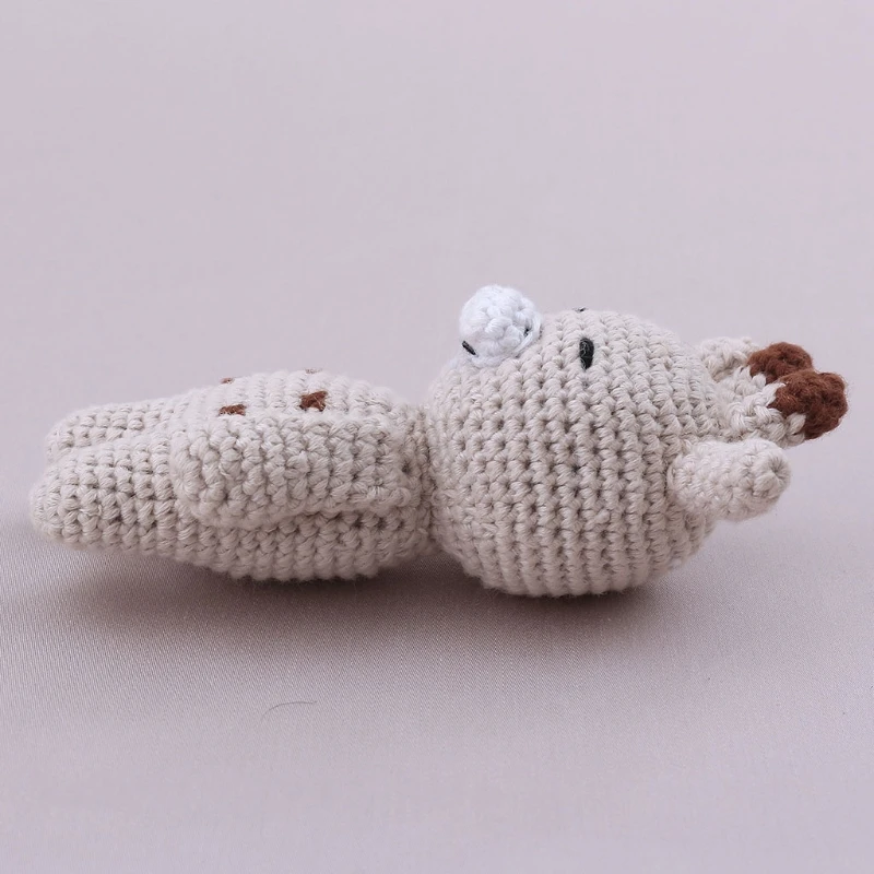 Hand knitted baby bear toy