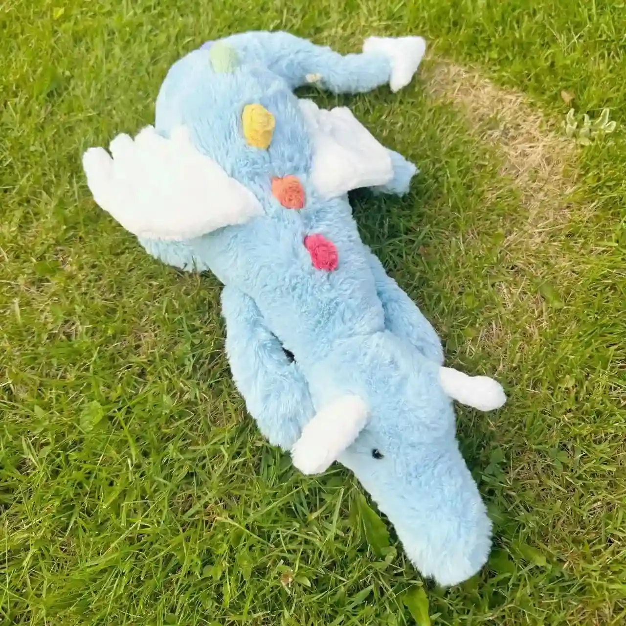 Anime themed stuffed dragon pillow