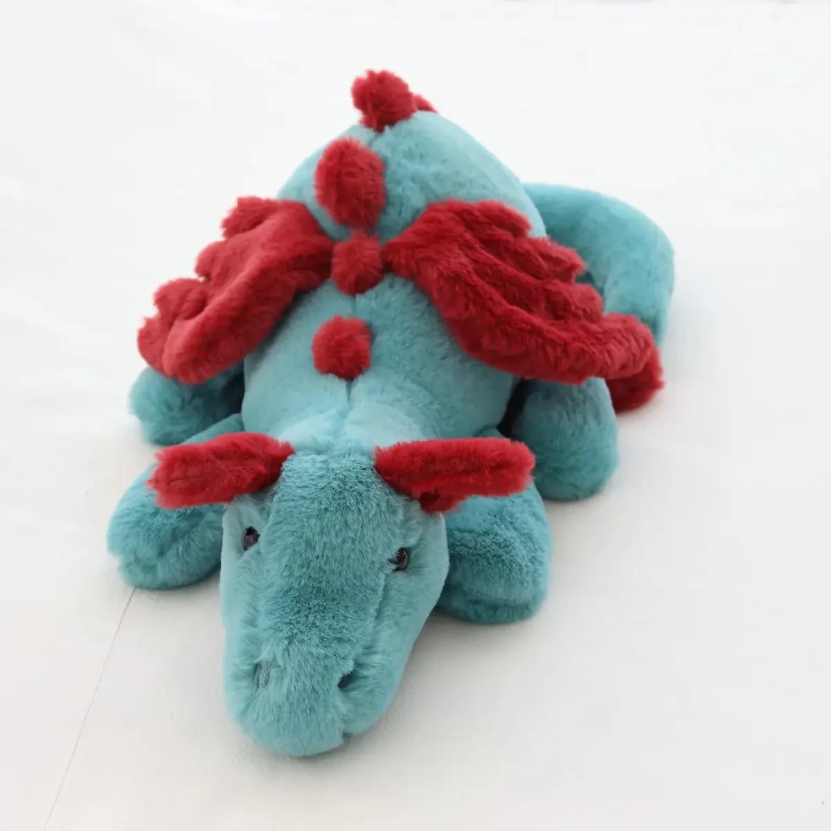 Fluffy blue pterosaur plush toy