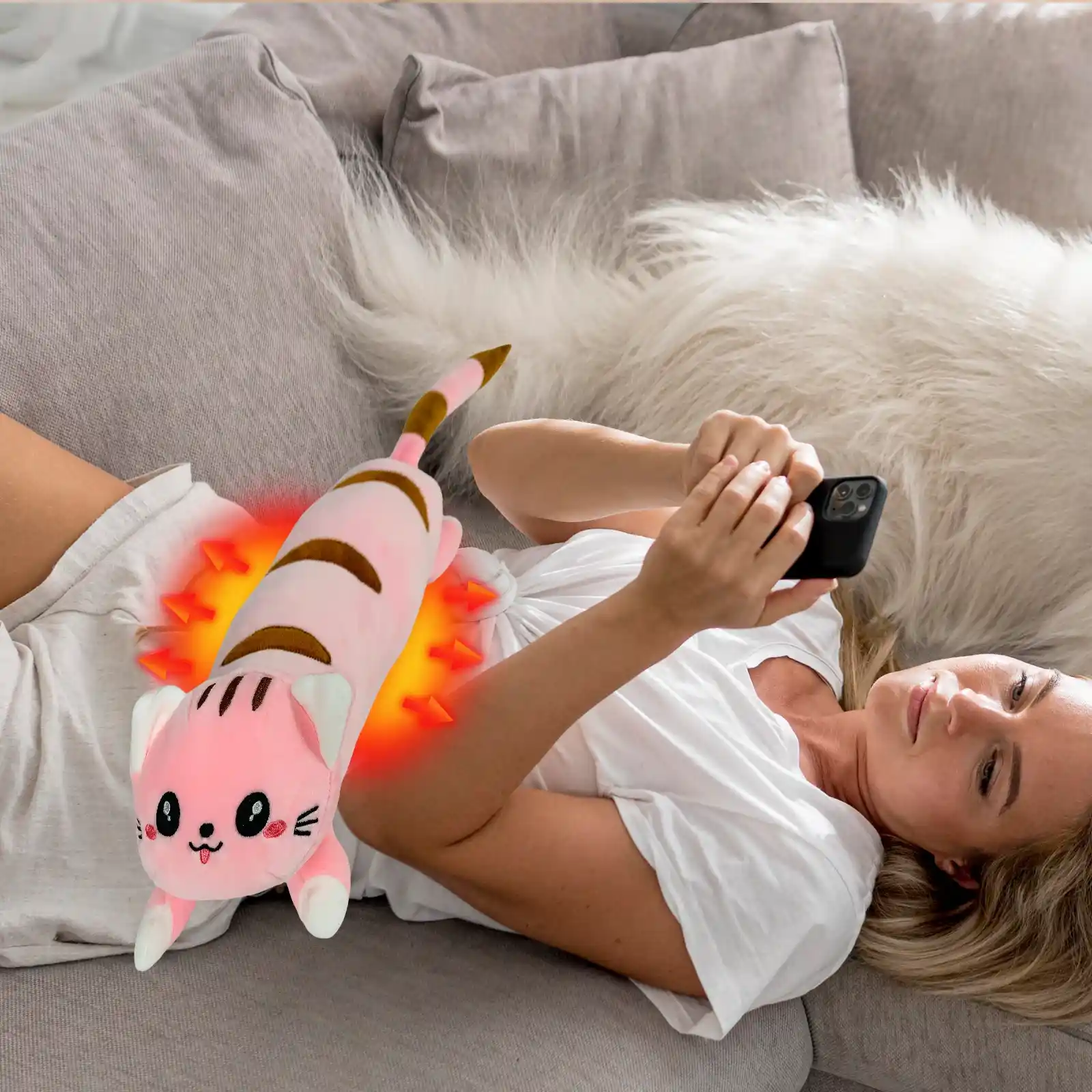 Heated plush cat pillow for pain relief