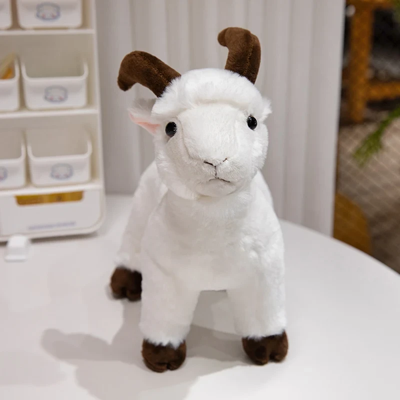 Lifelike black and white goat stuffed animal