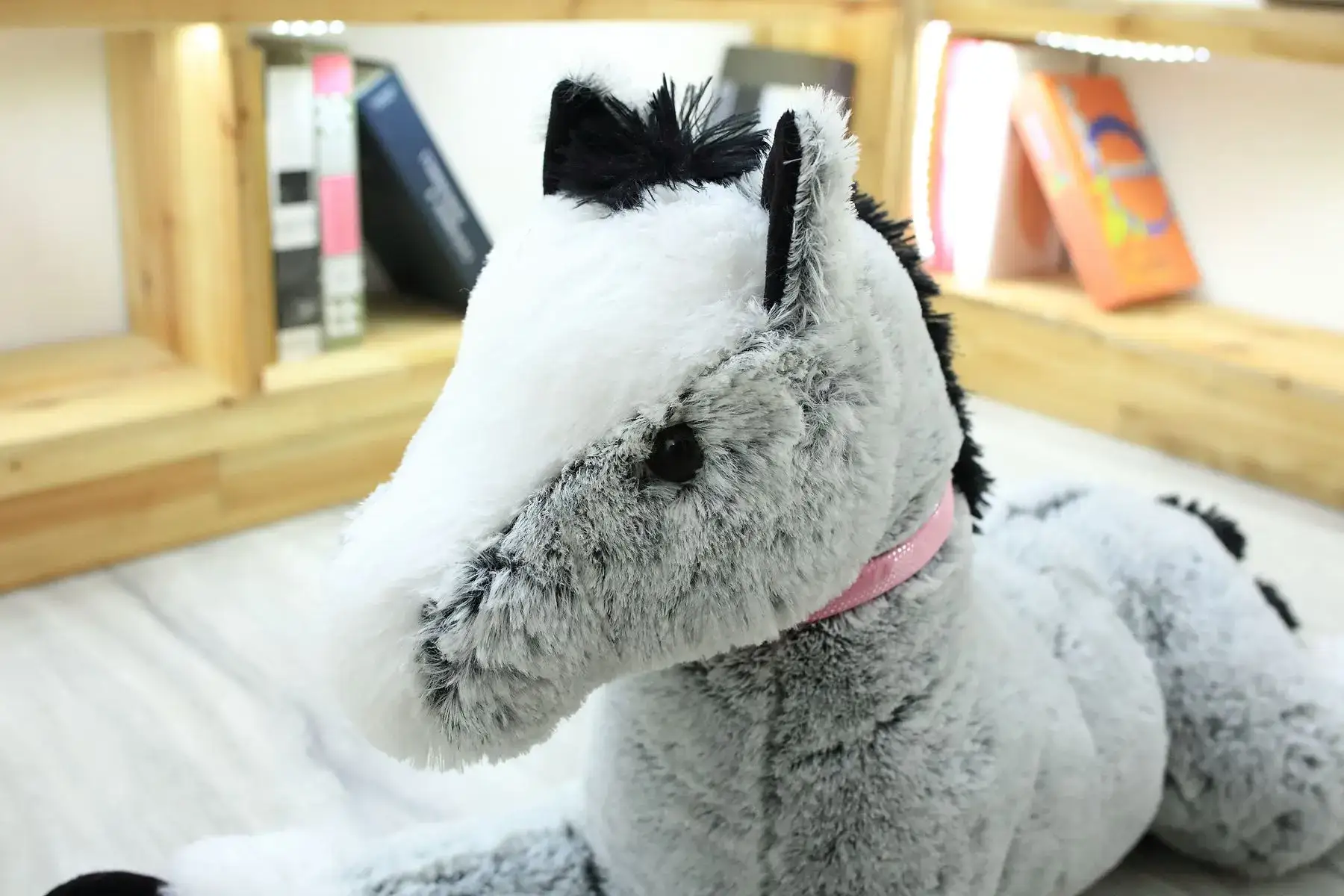 Playful unicorn stuffed toy